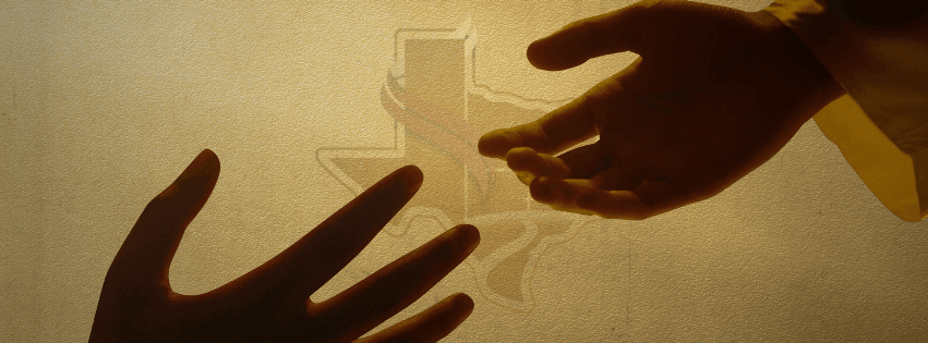 Hands giving and receiving support